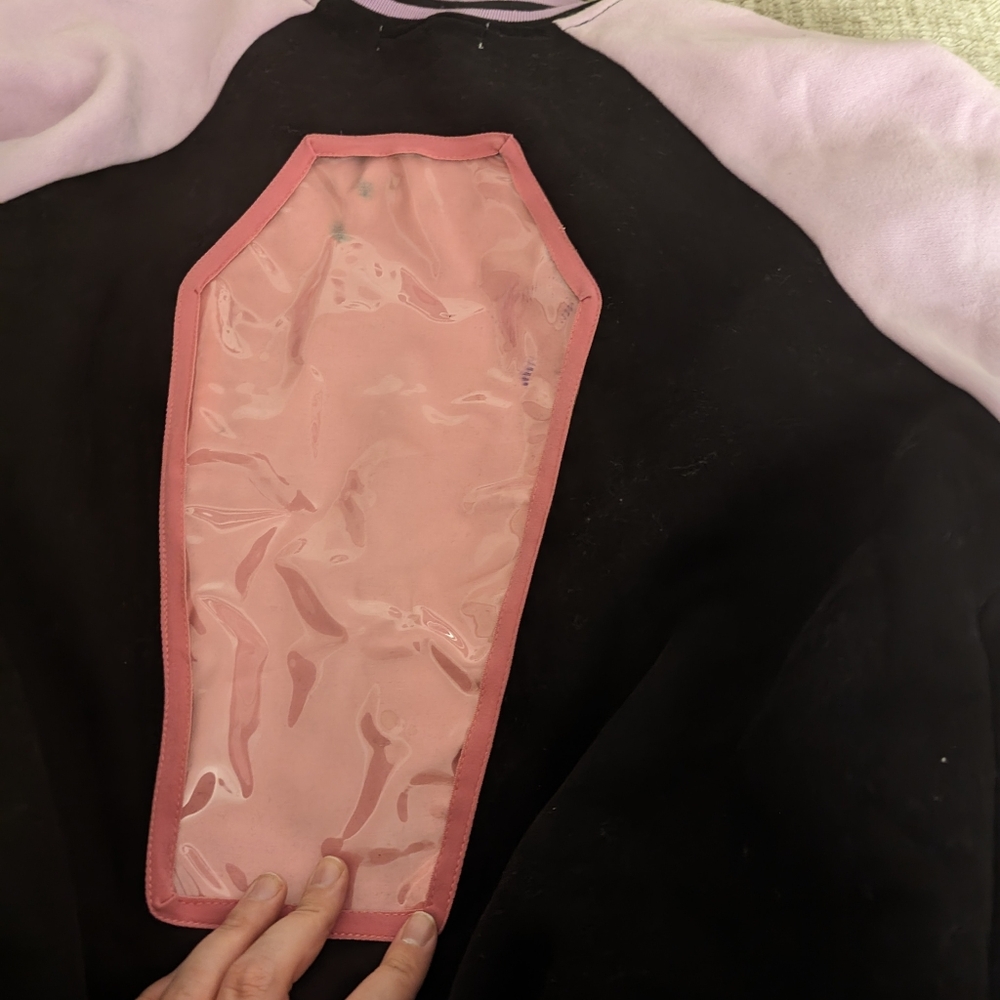 Alternative Letterman jacket with a pin back